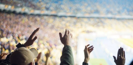 Football,Fans,Clapping,On,The,Podium,Of,The,Stadium