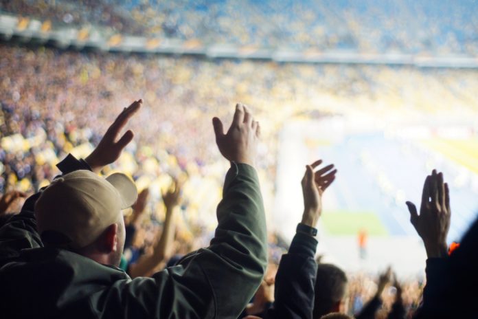 Football,Fans,Clapping,On,The,Podium,Of,The,Stadium