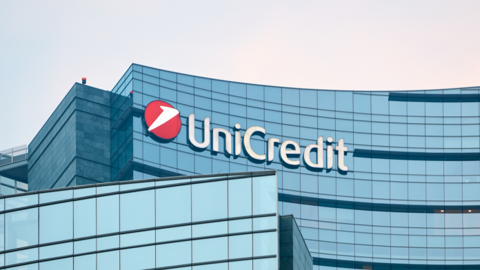 UniCredit logo on glass building.