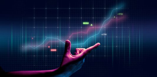 Hand pointing to increase on modern graph