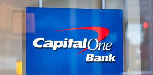 Capital One Bank sign in a shop-front.