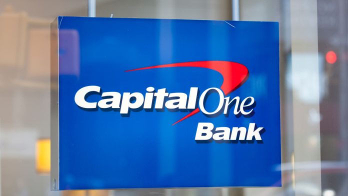 Capital One Bank sign in a shop-front.