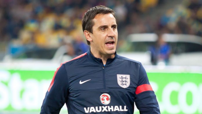 Gary Neville, assistant manager for the England national football team, walks on before FIFA World Cup 2014 qualifier game against Ukraine at NSC Olympic stadium.