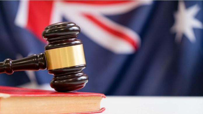 Gavel and legal book on wooden table, collage with flag of Australia.