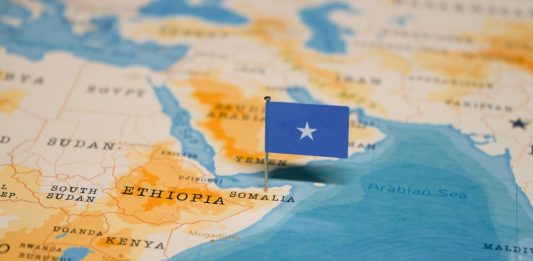 The Flag of Somalia on the World Map.