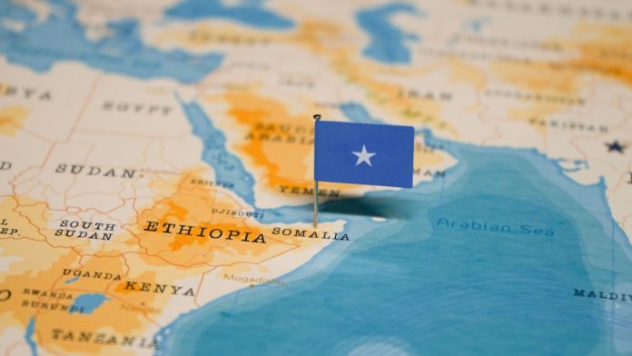 The Flag of Somalia on the World Map.