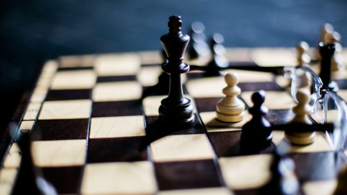 Black King on a chess board.