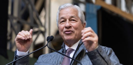 JPMorgan Chase CEO, Jamie Dimon, speaking at an event. The bank has announced it will allow Bitcoin holdings.