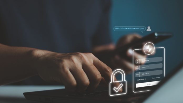 Image of someone entering details into a computer to verify their identification. Representative of LeoVegas' CEO statement.
