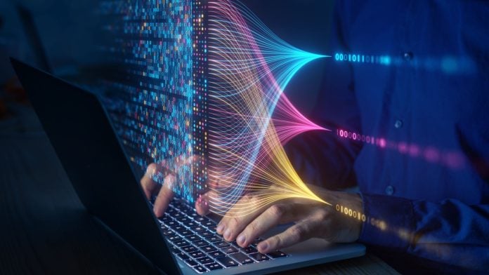 An image of a hands typing on a keyboard and numbers flow above showing enterprise payments