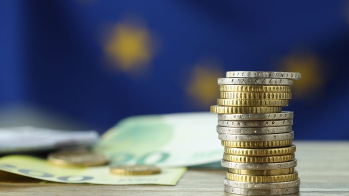 Image of a pile of euro coins following the announcement of funding round from Yolo Investments