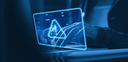 Payment fraud characterized by a warning symbol on a screen