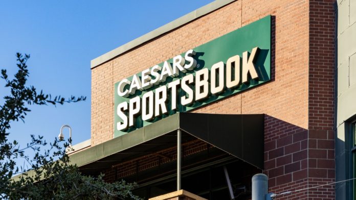 Phoenix, AZ, USA - October 28, 2023: Caesars Sportsbook is located outside of Chase Field in downtown Phoenix and people can bet on sports throughout the country on their app as well.