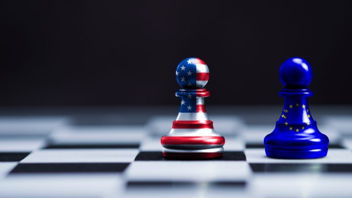 USA flag and EU flag print screen on two pawn chess for battle.It is symbol of United States of America increase tariff tax barrier for import product from EU countries.-Image.