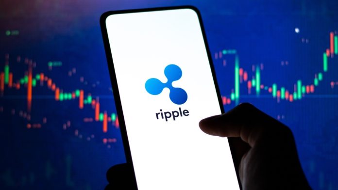 West Bangal, India - February 4, 2022 : Ripple logo on phone screen stock image.