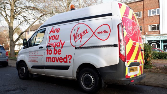 Chorleywood, Hertfordshire, England, UK - January 23rd 2021: Virgin Media Ford Transit van