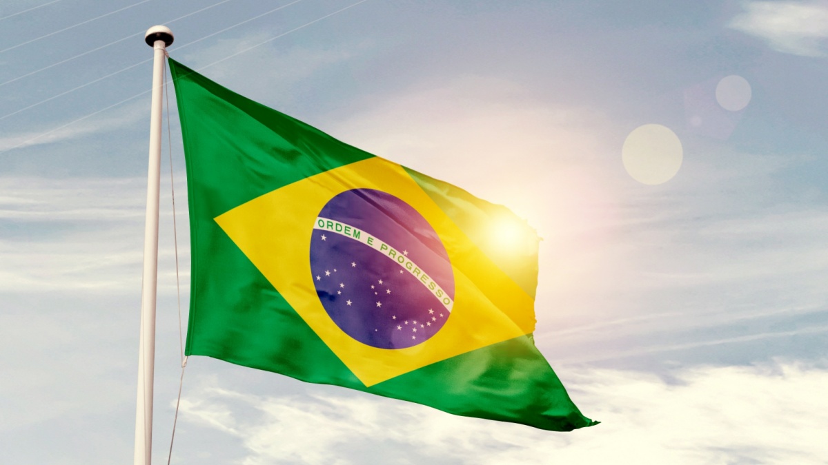 Brazil flag waving on white background with clipping path. Cliping path is easily cutout the flag.