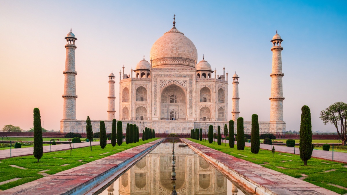 Taj Mahal is a white marble mausoleum on the bank of the Yamuna river in Agra city, Uttar Pradesh state, India.