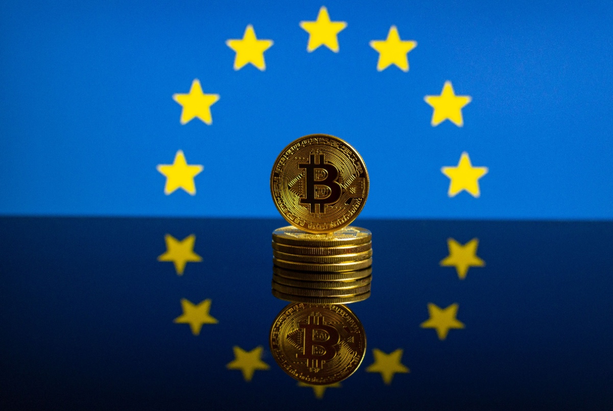 Image of a pile of bitcoin in front of an EU flag