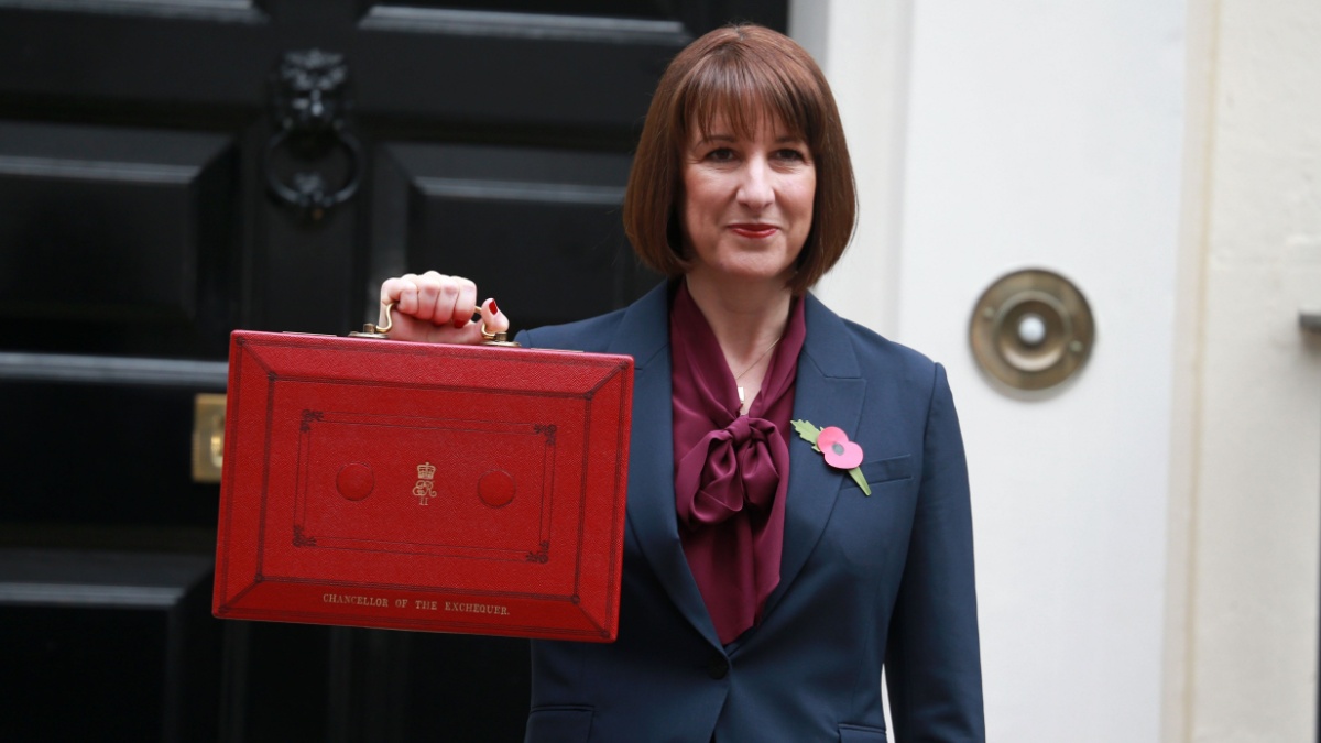 Rachel Reeves, poses outside 11 Downing Street ahead of presenting the Autumn Budget 2024