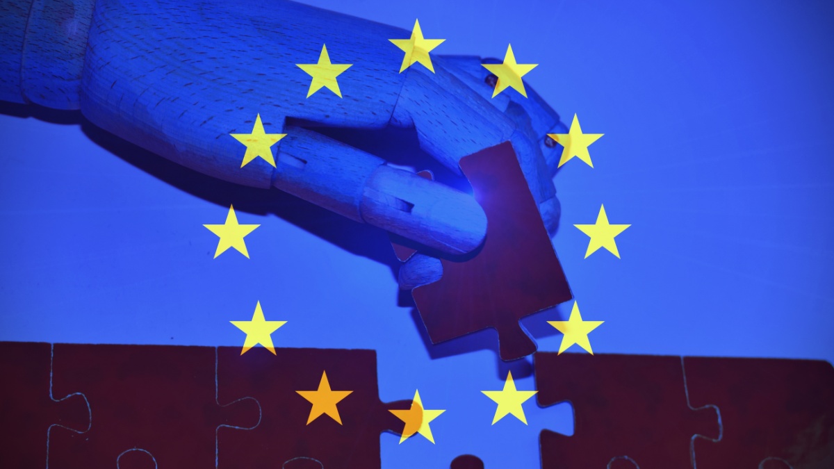 European flag with a robot hand with a jigsaw puzzle.