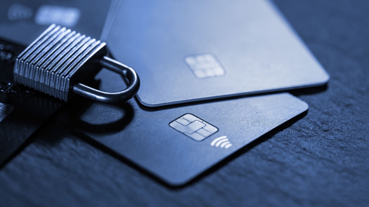 Credit card data security concept with padlock representing safer payments