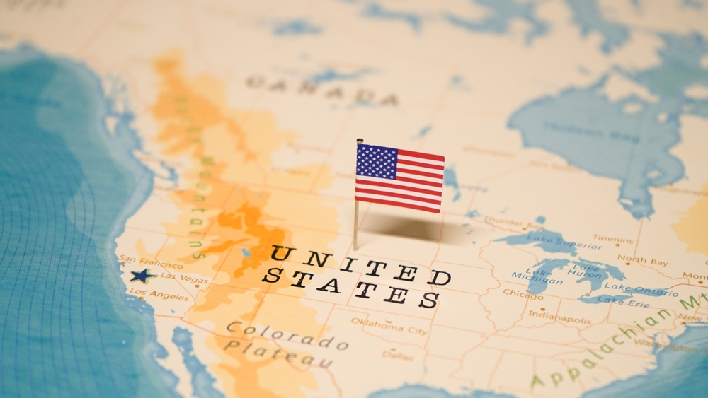 The Flag of United States on the World Map, following US regulators hearing