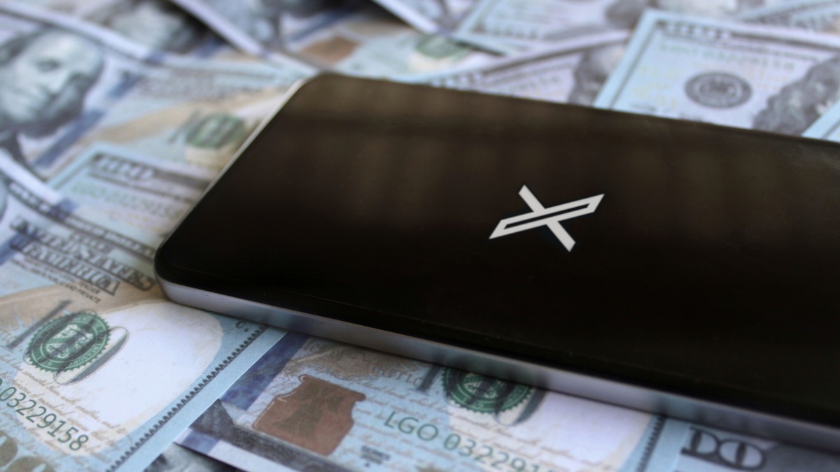 Kedah, Malaysia- July 30th 2023: Social networking service X app logo on smartphone and money. Twitter rebrand as X. Revenue, business and profit concept