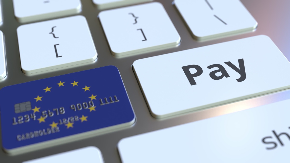Bank card featuring flag of the European Union as a key on a computer keyboard. EU online payment conceptual 3D rendering