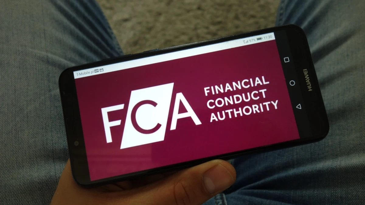 Financial Conduct Authority - FCA logo displayed on mobile phone.
