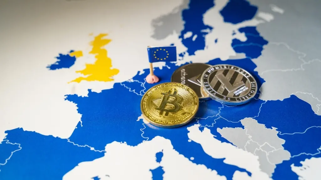 Golden Bitcoin and other crypto over map of EU.
