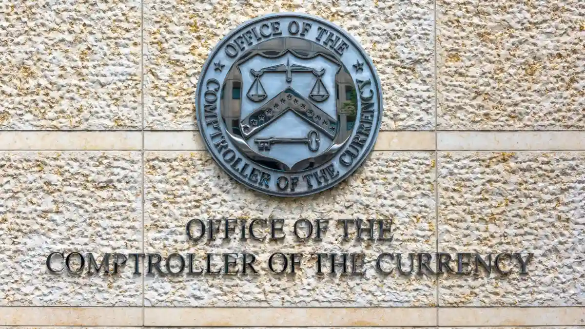 Office of the Comptroller of Currency sign and logo in downtown.