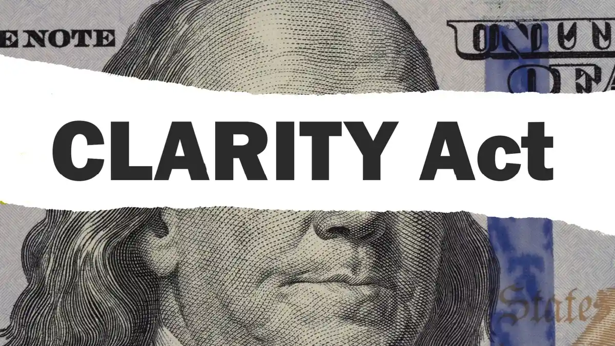 US one hundred dollar bill featured with a white ripped paper stripe displaying the bold text Clarity Act.