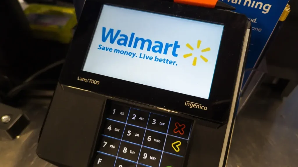 Apex, North Carolina - May 13 2025: Walmart Card Reader Machine POS Cashier Payment System Logo Display 