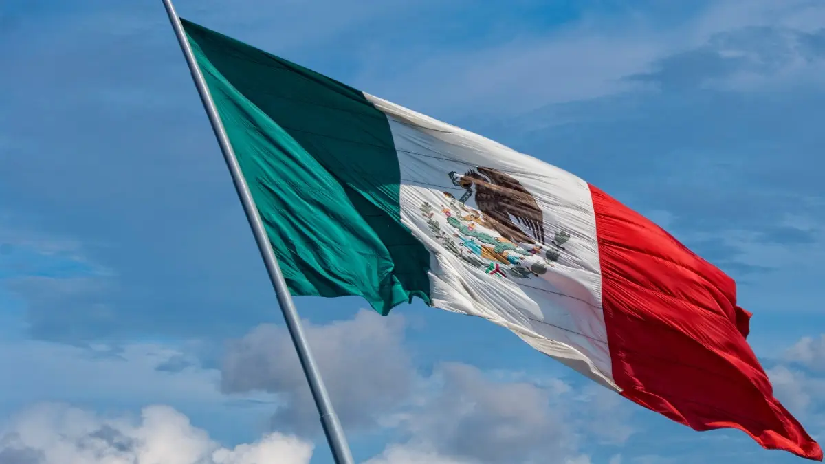 mexican flag weaving on sky background