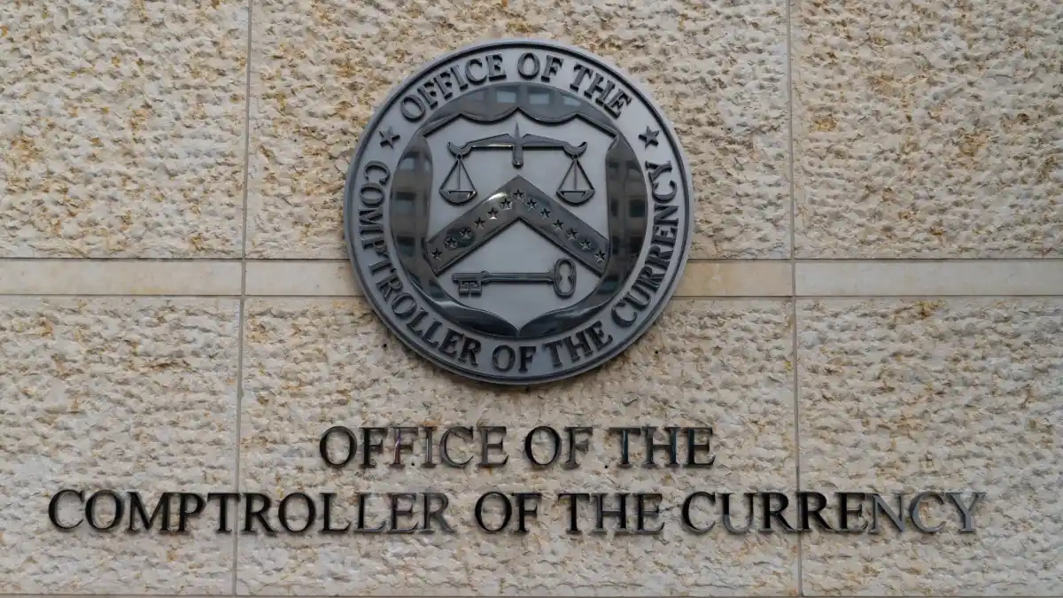 Washington, D.C., USA - February 26, 2022: Seal of the Office of the Comptroller of the Currency at Headquarters Building, announced final rule of Genius Act.